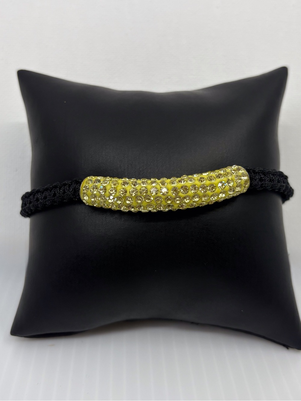 Yellow Crystal Tube Bracelet on Black Braided Cord